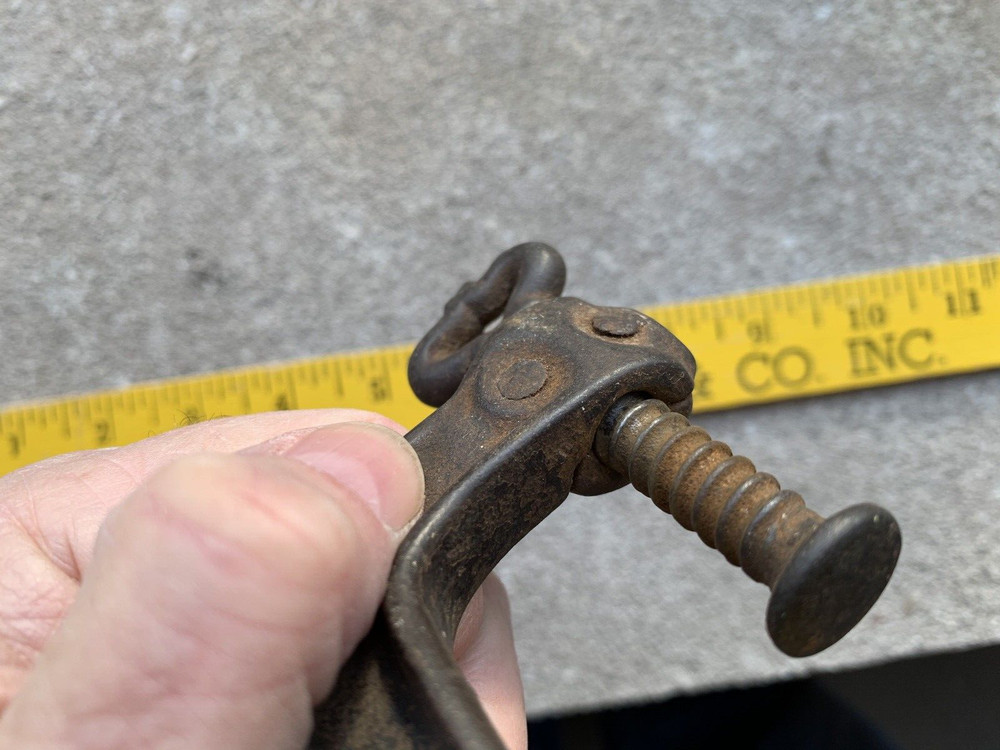 Small iron clamp held together with pins