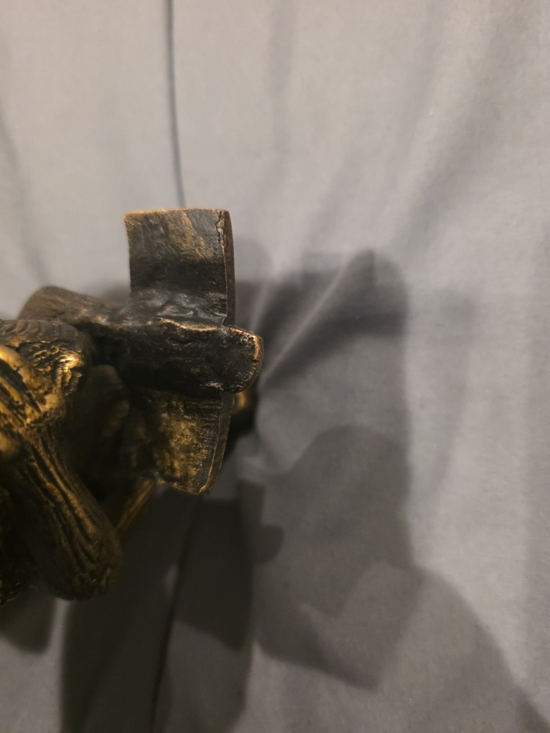 Bronze sculpture. Monkey with a book.