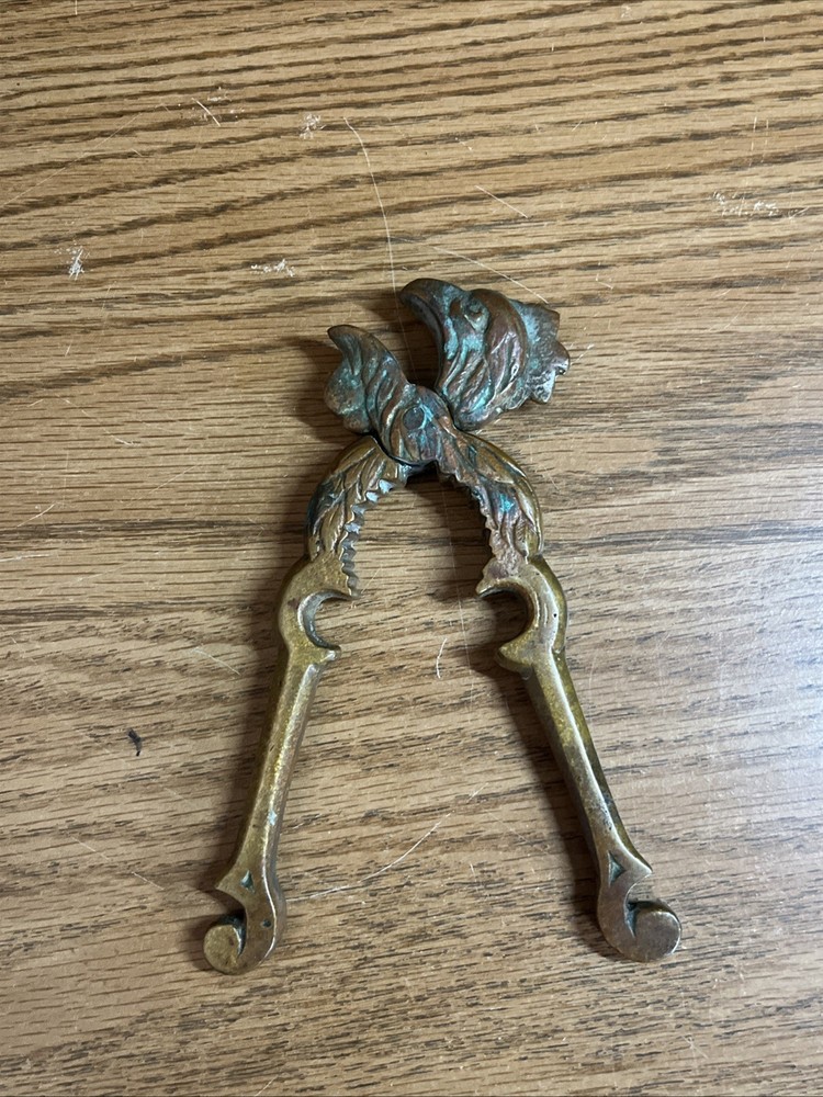 Vintage solid Metal Rooster chicken Nut Cracker, Bottle opener .