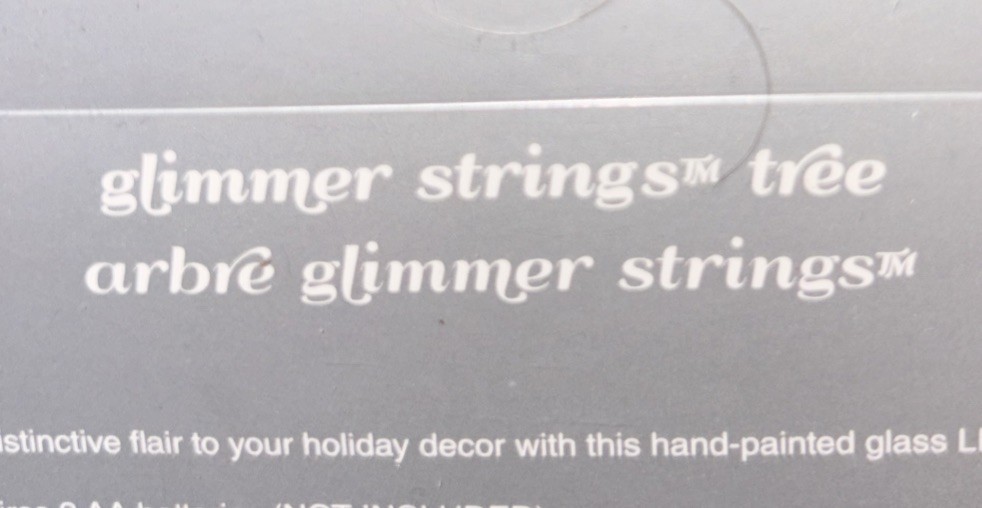 Pier 1 Imports 10 inch Lighted silver cone shaped tree- timer glimmer strings