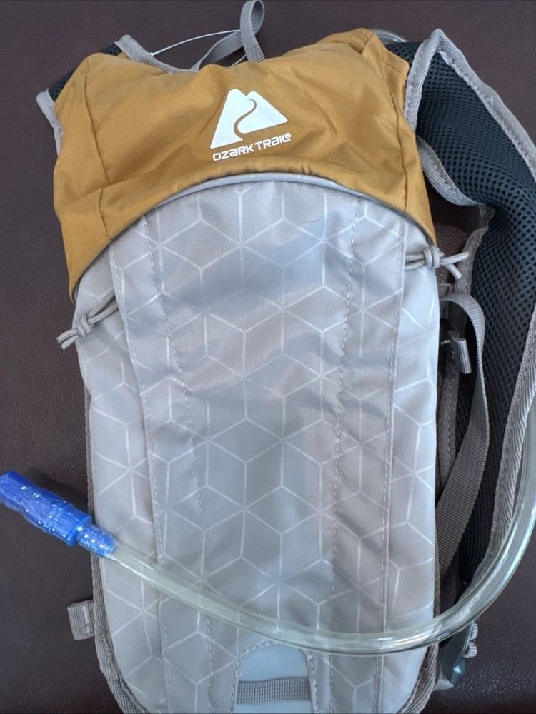 Ozark Trail Hydration Backpack with Hydration Bladder, 2L, Orange/Grey W/Pockets