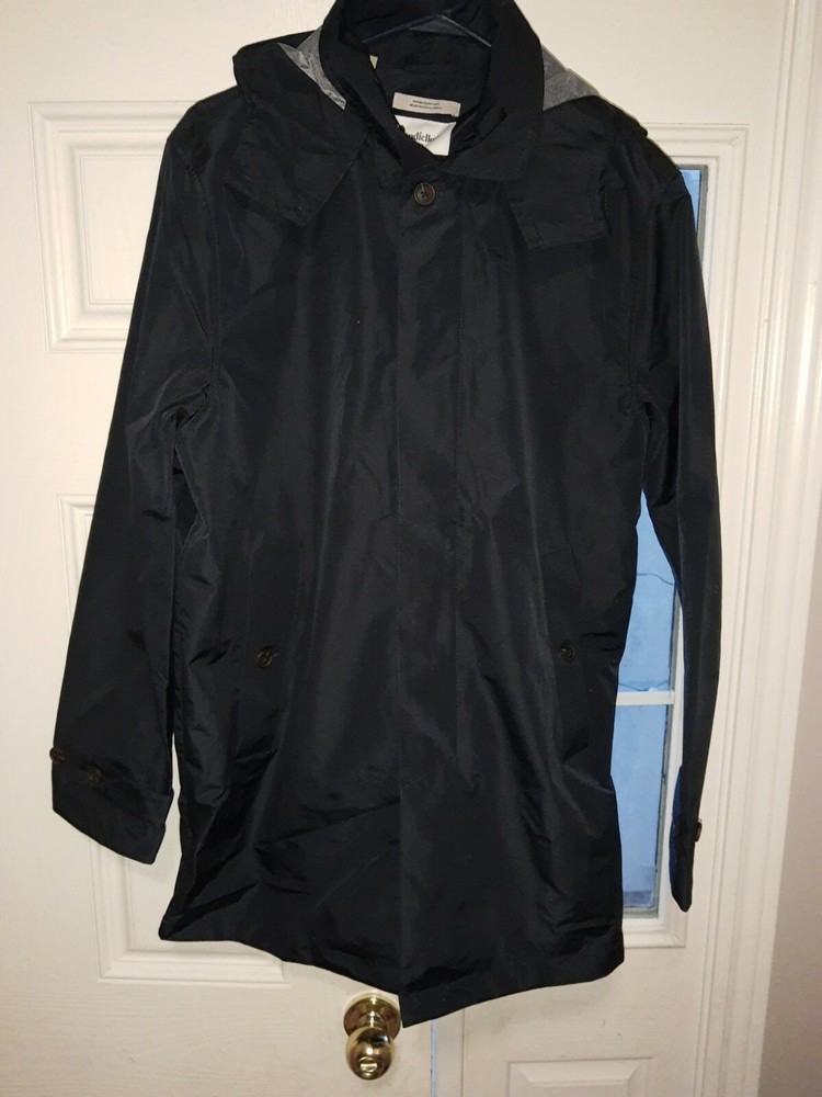 Goodfellow navy rain resistant windproof hooded jacket.