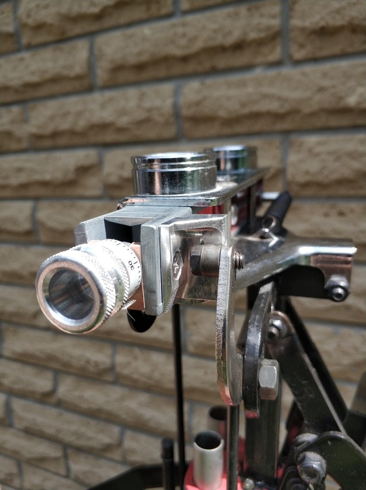 Cam bracket for universal charge bar model D for Mec Progressive