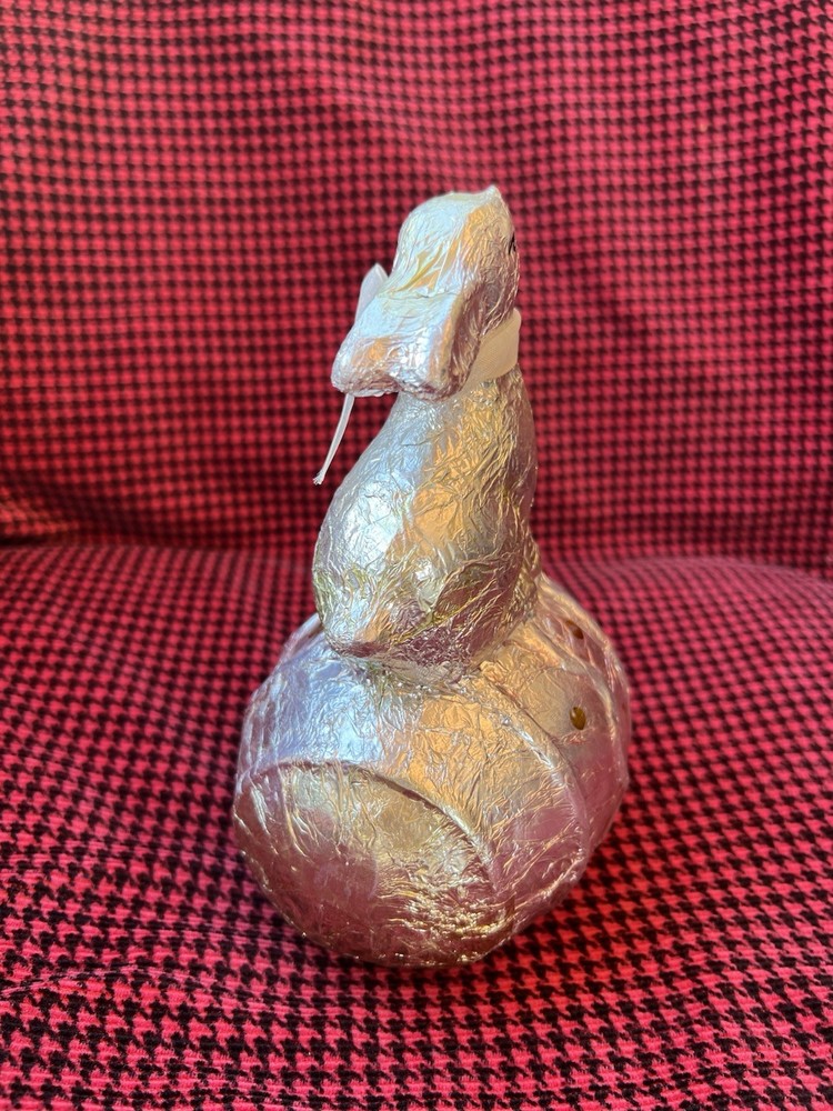 Faux Foil Large Easter Bunny sitting on an Easter Egg