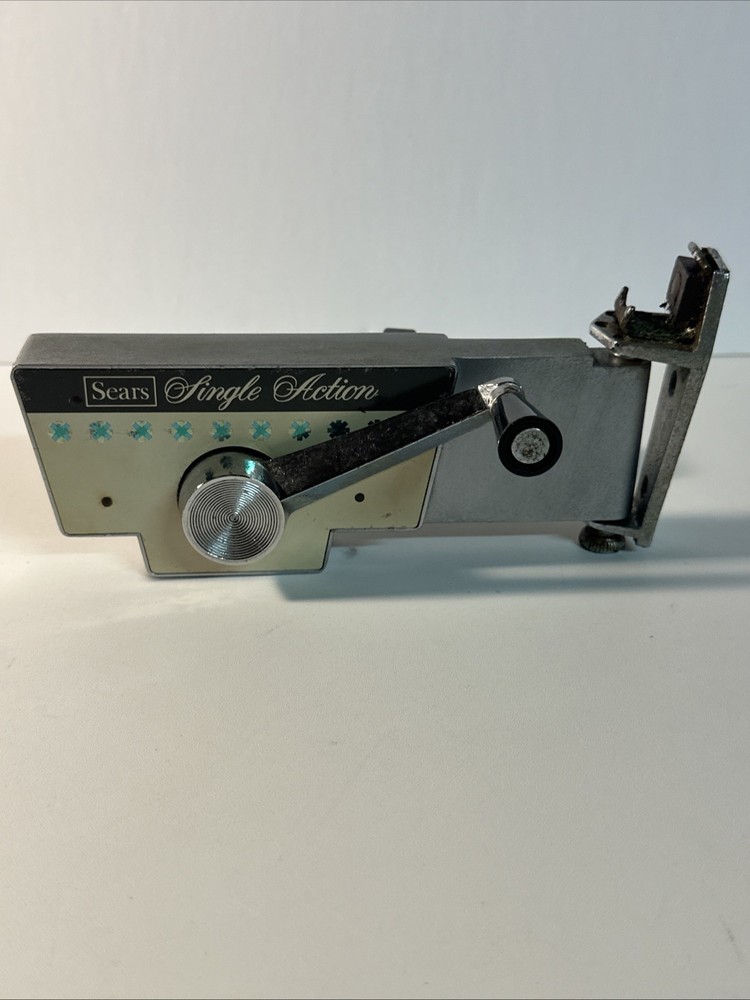 Sears single action wall mounted can opener