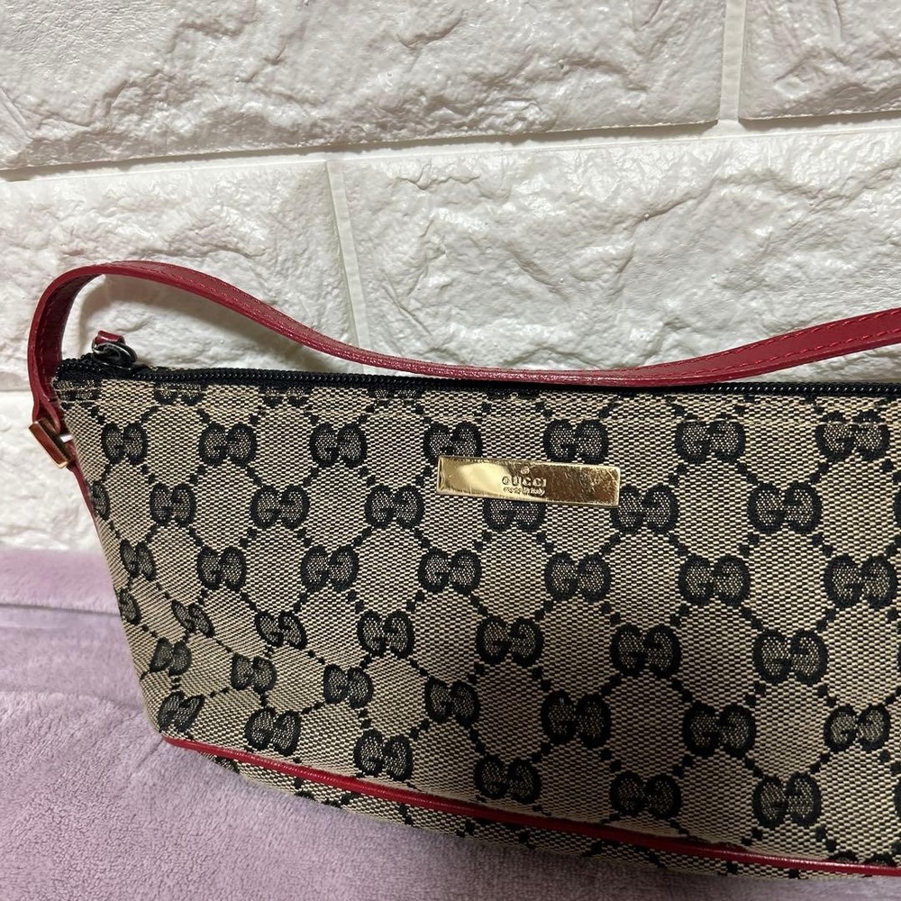 Gucci Accessory Pouch GG Canvas Handbag