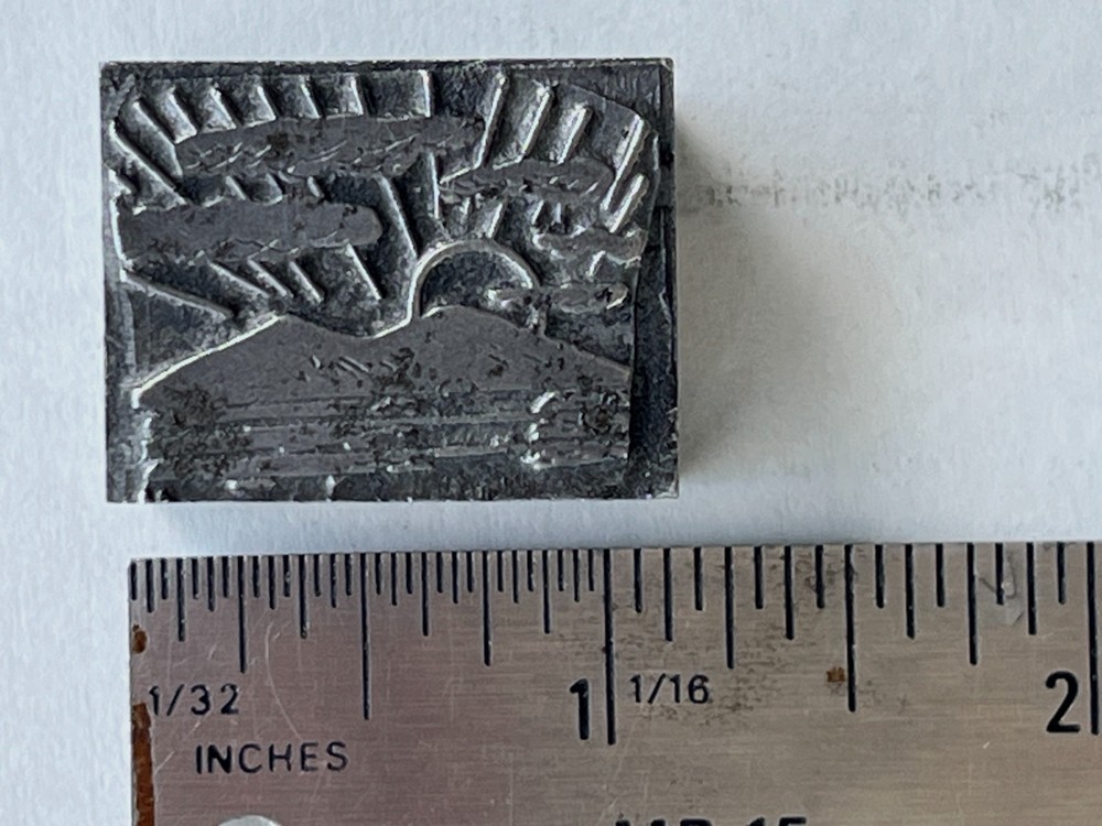 Letterpress Print Block Cut Sunrise Over Mountains