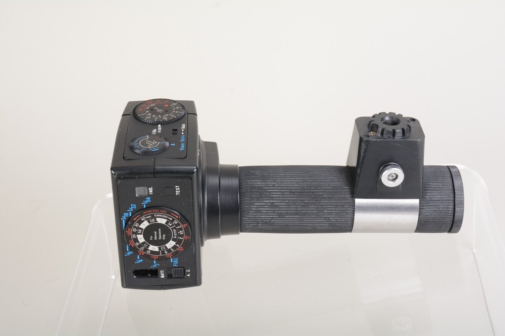 Sunpak Auto 511 Handle Mount Flash w/ Bracket. Fair condition. Tested Good 498