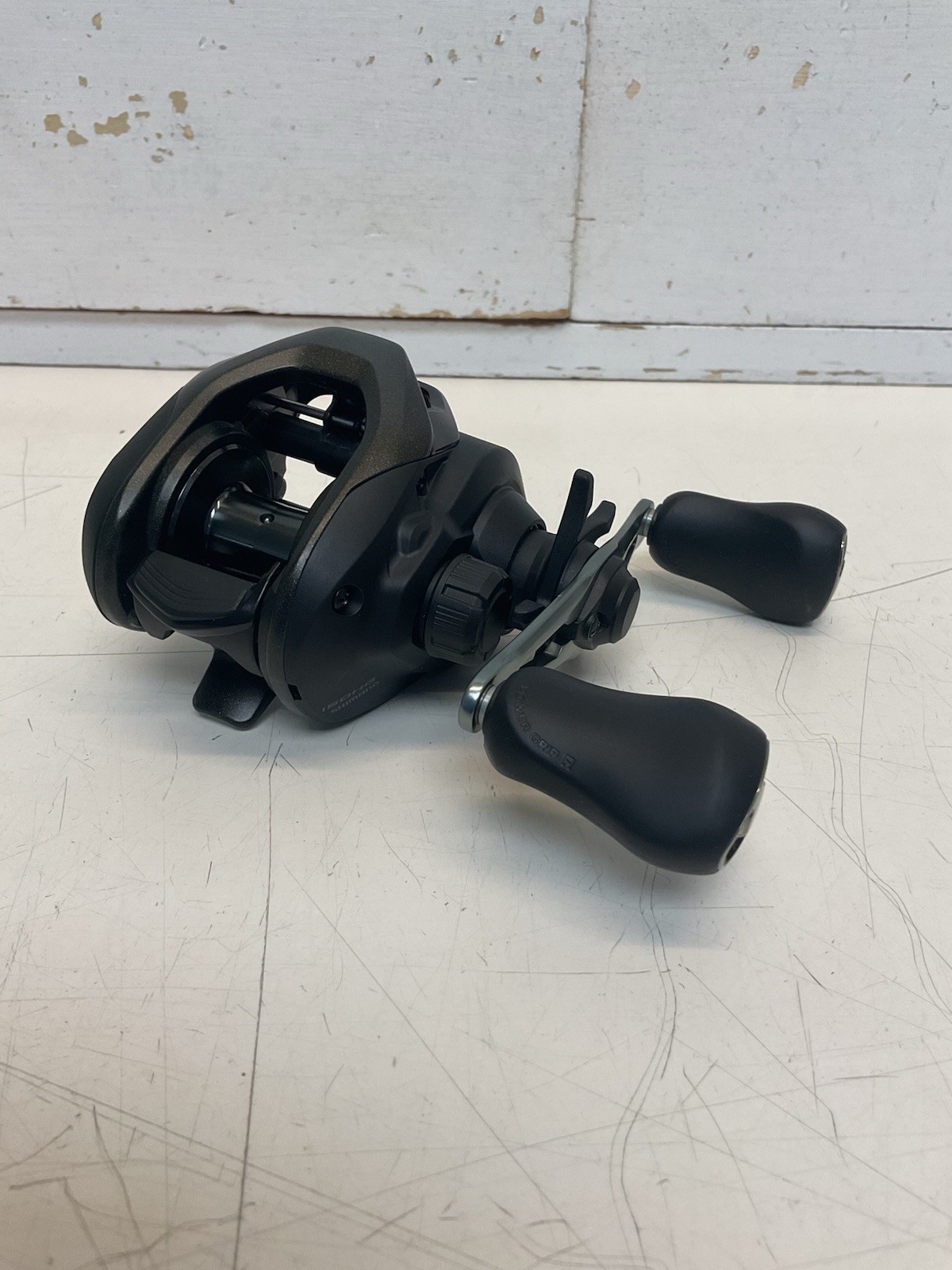 SHIMANO "CAIUS-150-HG-C" BAITCASTER--7.2.1. GR--R-HAND (NO-BOX)