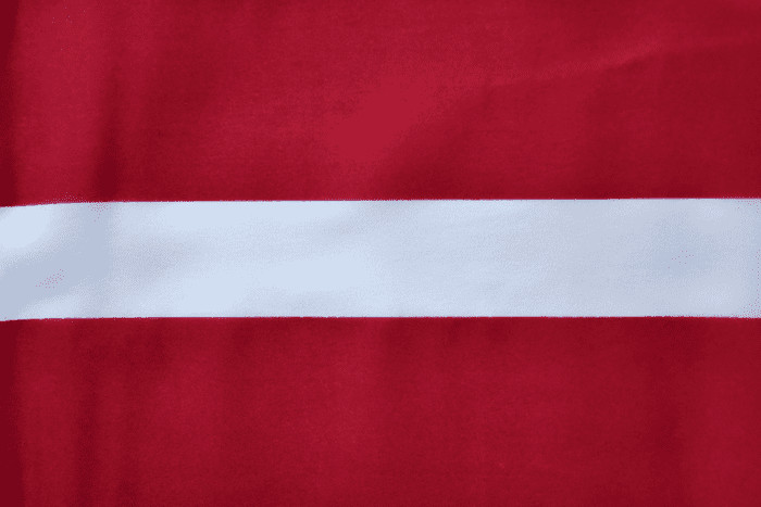 Latvia Hand Flag (9" x 6")