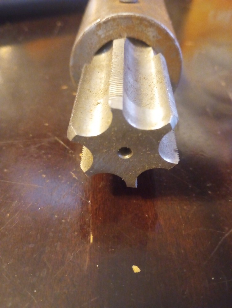 spindle shaft with tap for machining