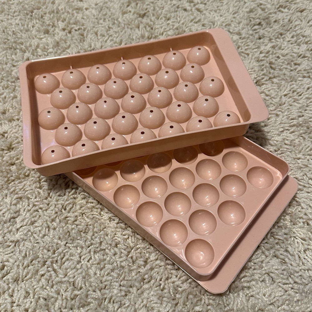 Round plastic ice cube mold light pink