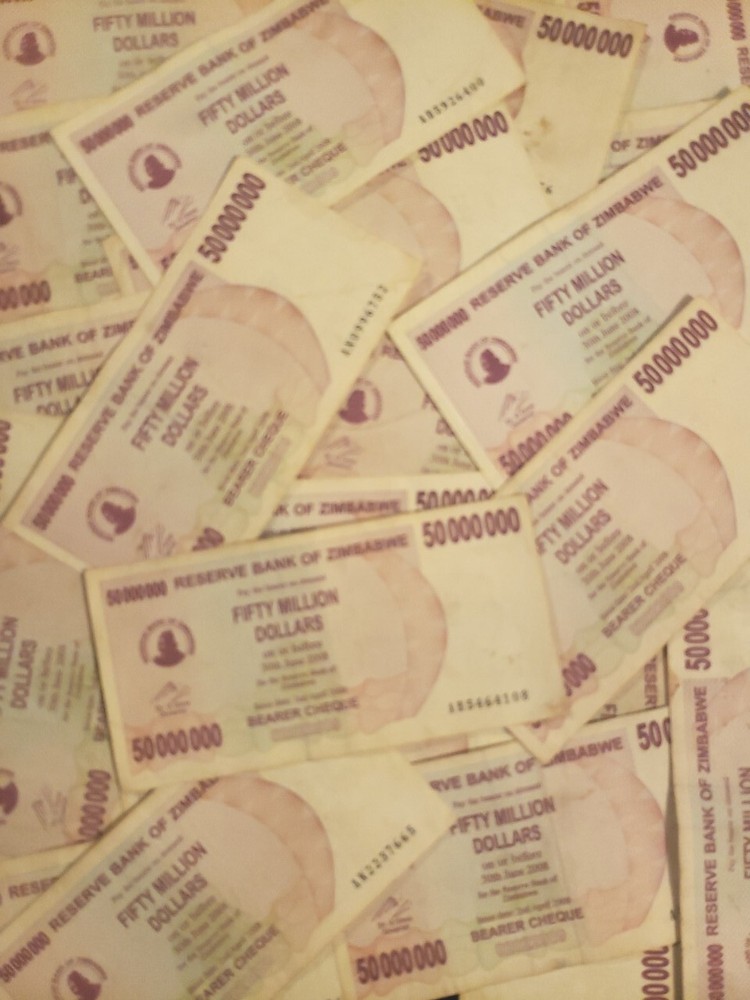 Zimbabwe 50 Million Dollar Cheques X 25 -1/4 bundle-2008 circulated It.# E-44