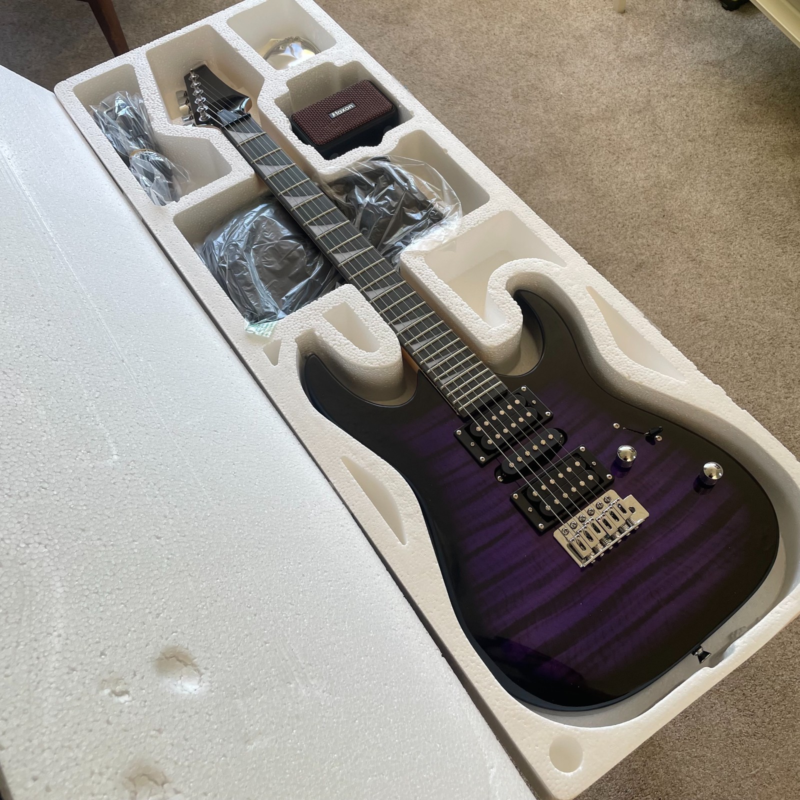 Full-Size Purple Electric Guitar and 5-Watt Amp Starter Package with Accessories