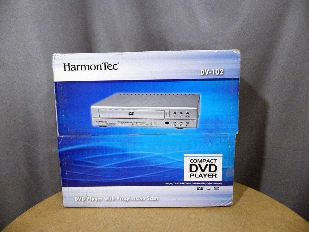 Compact dvd Player Harmon Tec model DV-102 with Remote  Cables  Open Box New