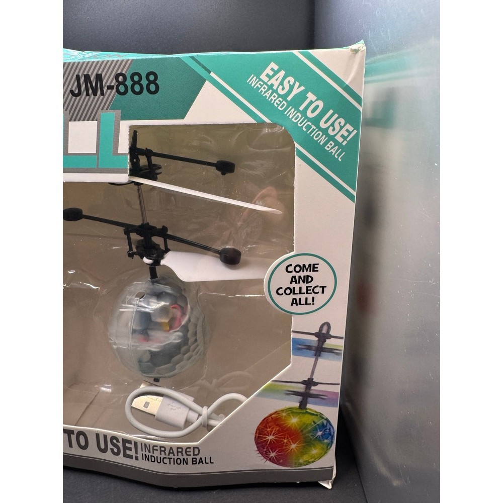 NWT Flying Ball Toy- Box got damaged a bit