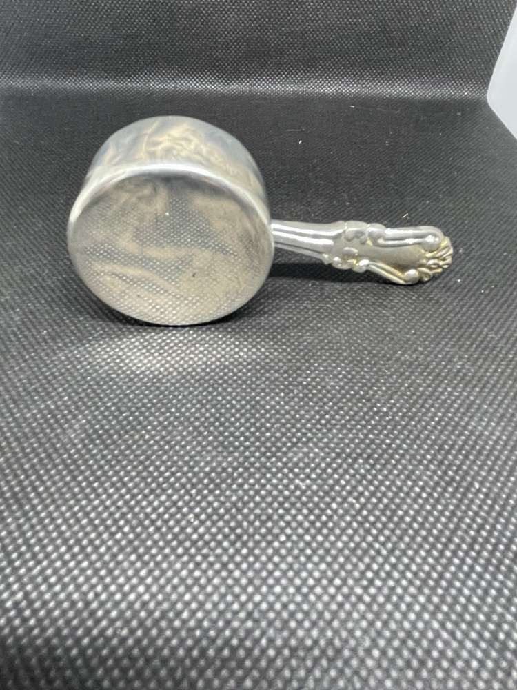 SILVER PLATED COFFEE MEASURE.
