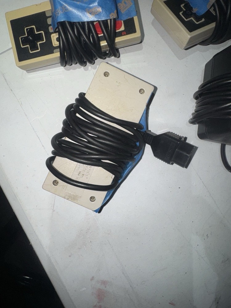 Nintendo Ac Plug And 3 Controllers