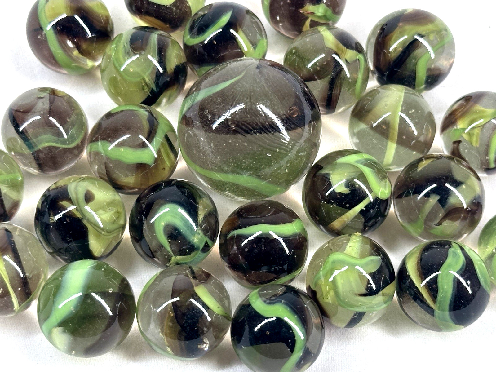 25 Glass Marbles BIGFOOT Clear/Green/Brown Shooter game Pack Swirl