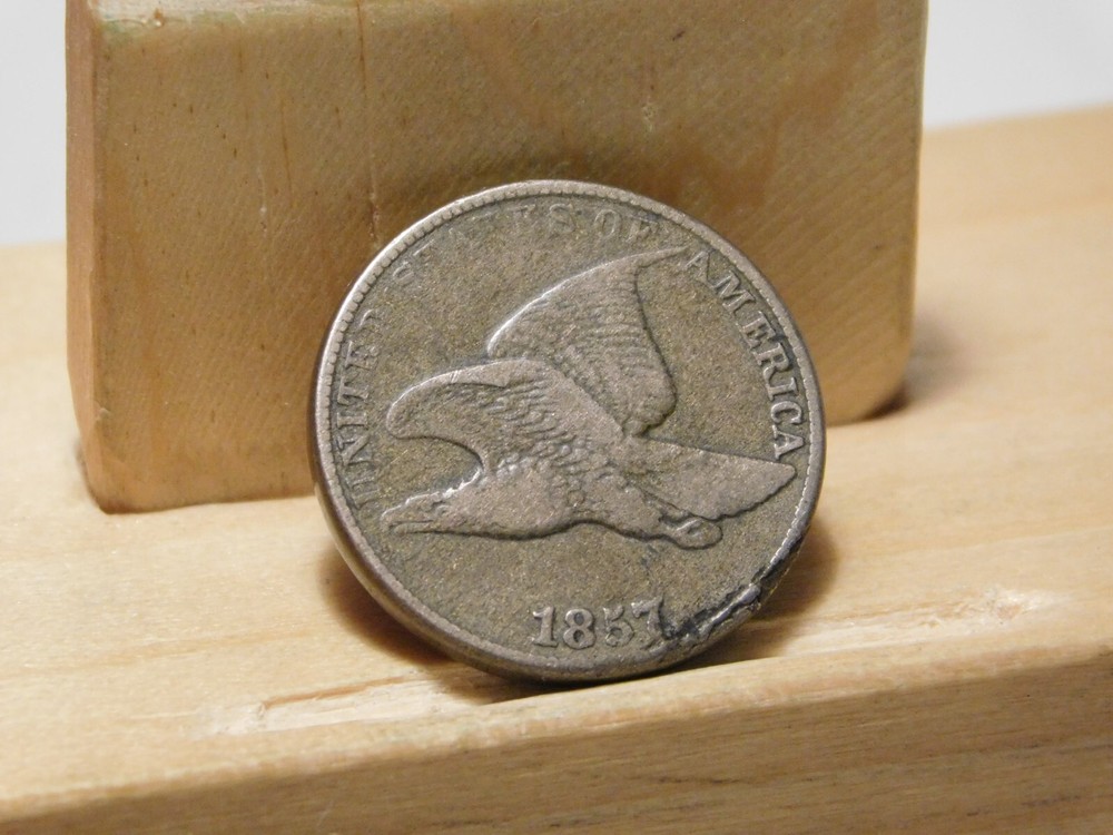 1857 U.S. Flying Eagle cent, lamination error at edge