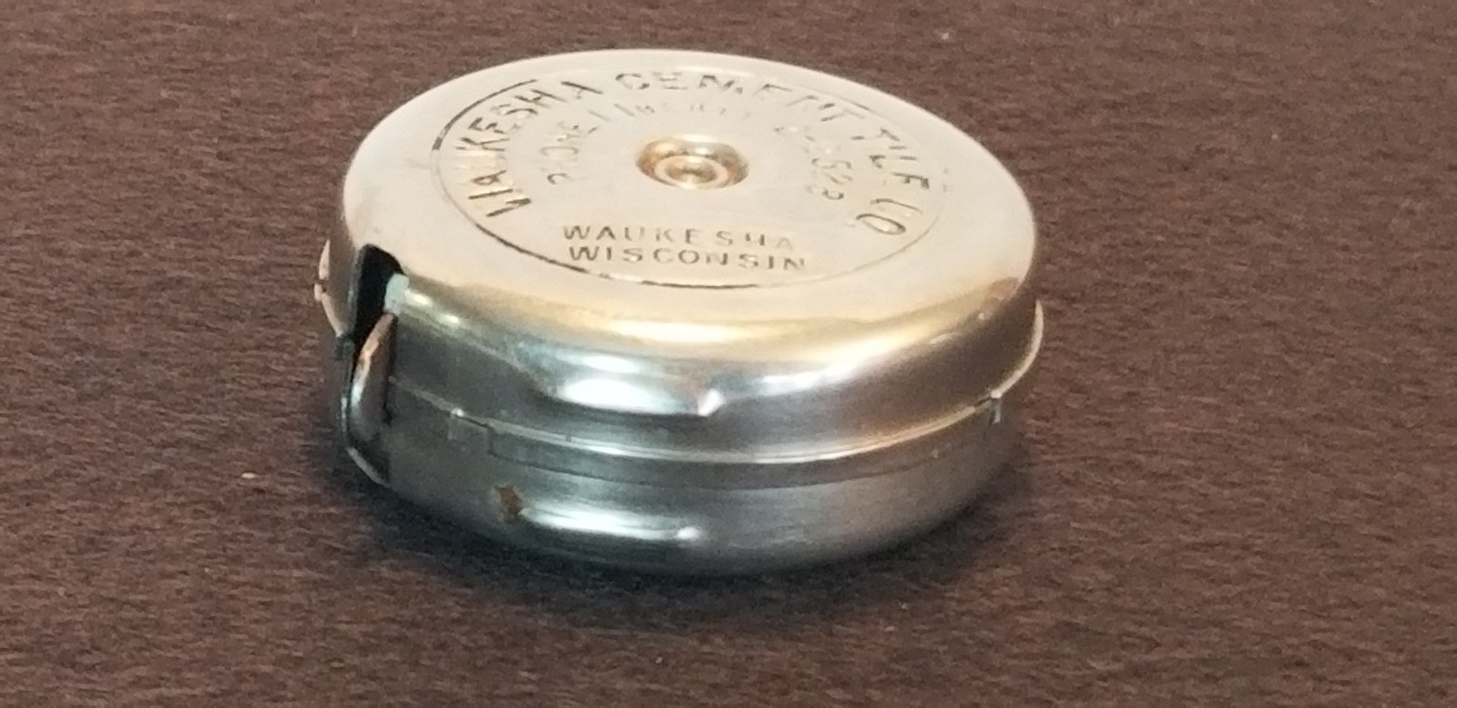 Vintage 1930s Lufkin Round Waukesha Cement And Tile Co. 6ft Tape Measure