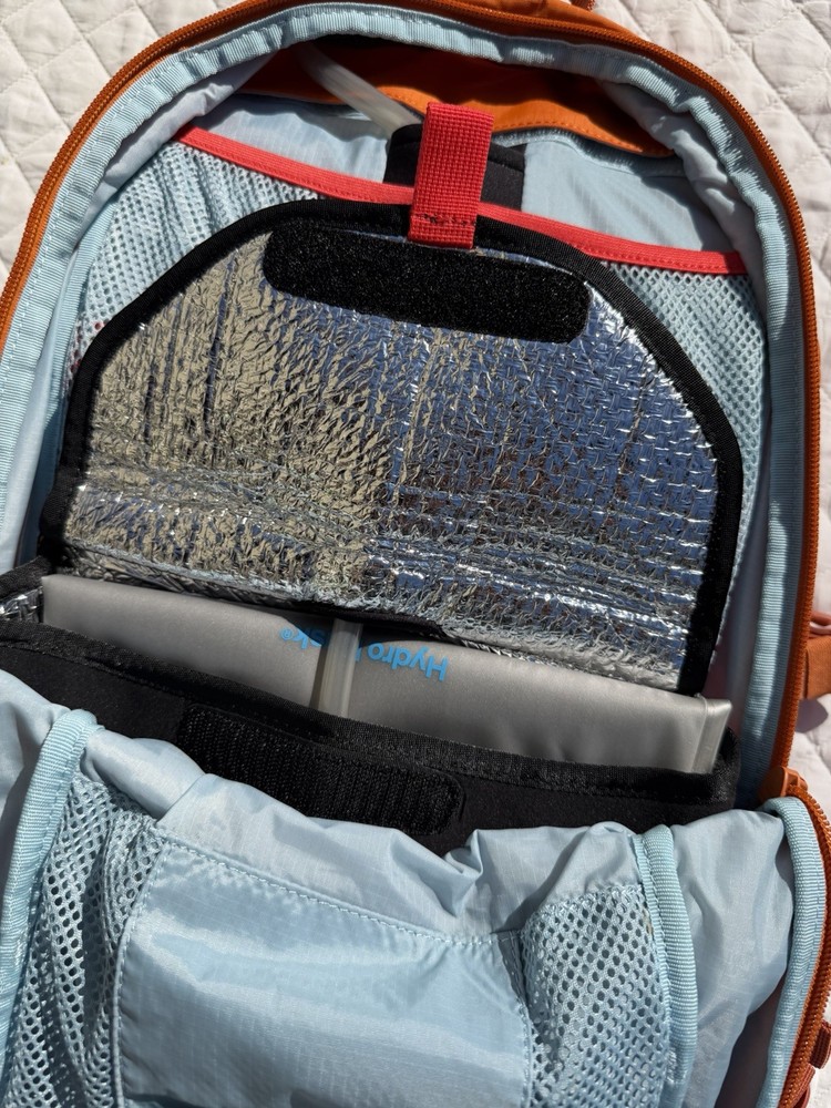 Hydro Flask Down Shift Hiking Backpack 14 Liter Hydration Day Pack Bronze Orange