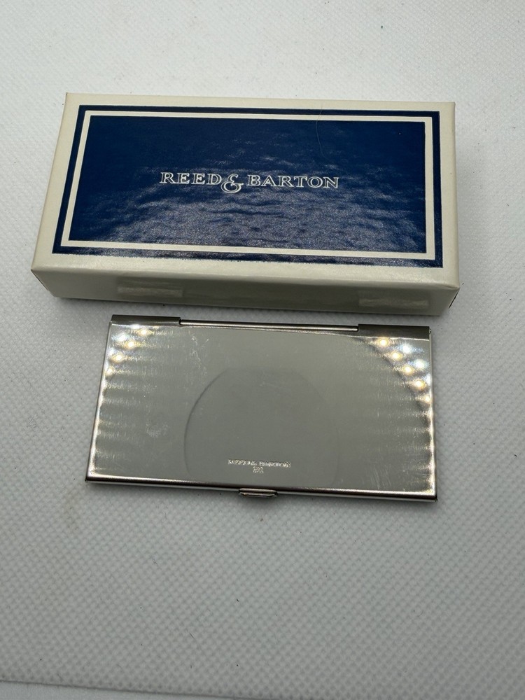 Reed and Barton Stamp Case.