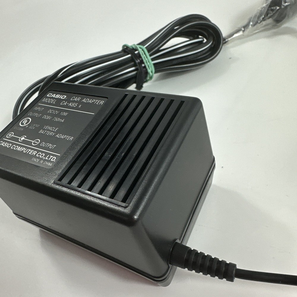 Casio Car Adaptor Plug Model CA-K65 Input DC 12V 13W Output DC 6V, 1A