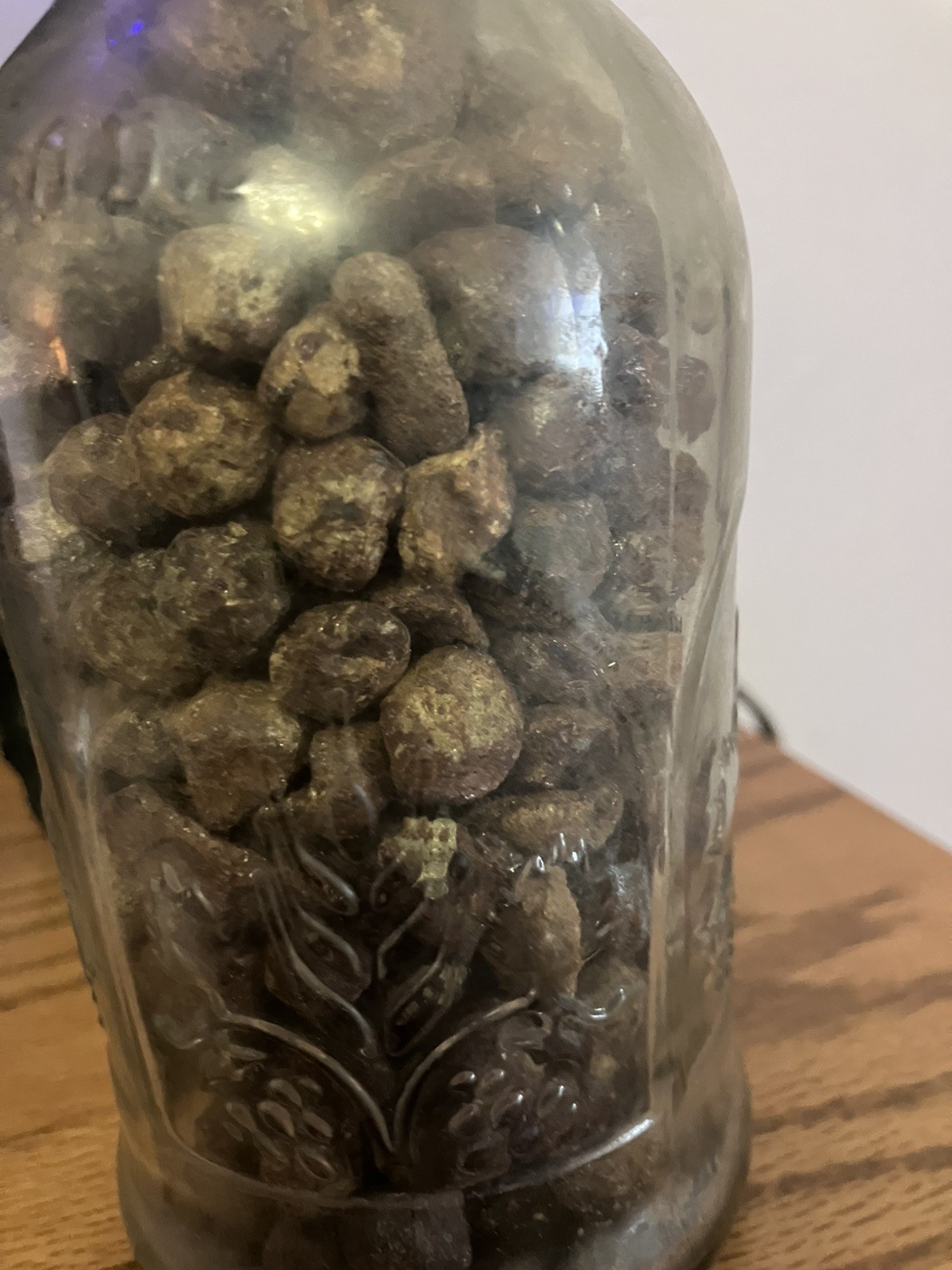 Lot of Idaho Star Garnet 3.44 pounds including glass.