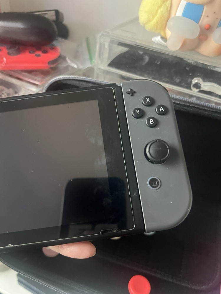 Nintendo Switch Console w/ Joy-Con, Grip, tomtoc Case, Thumb Grips