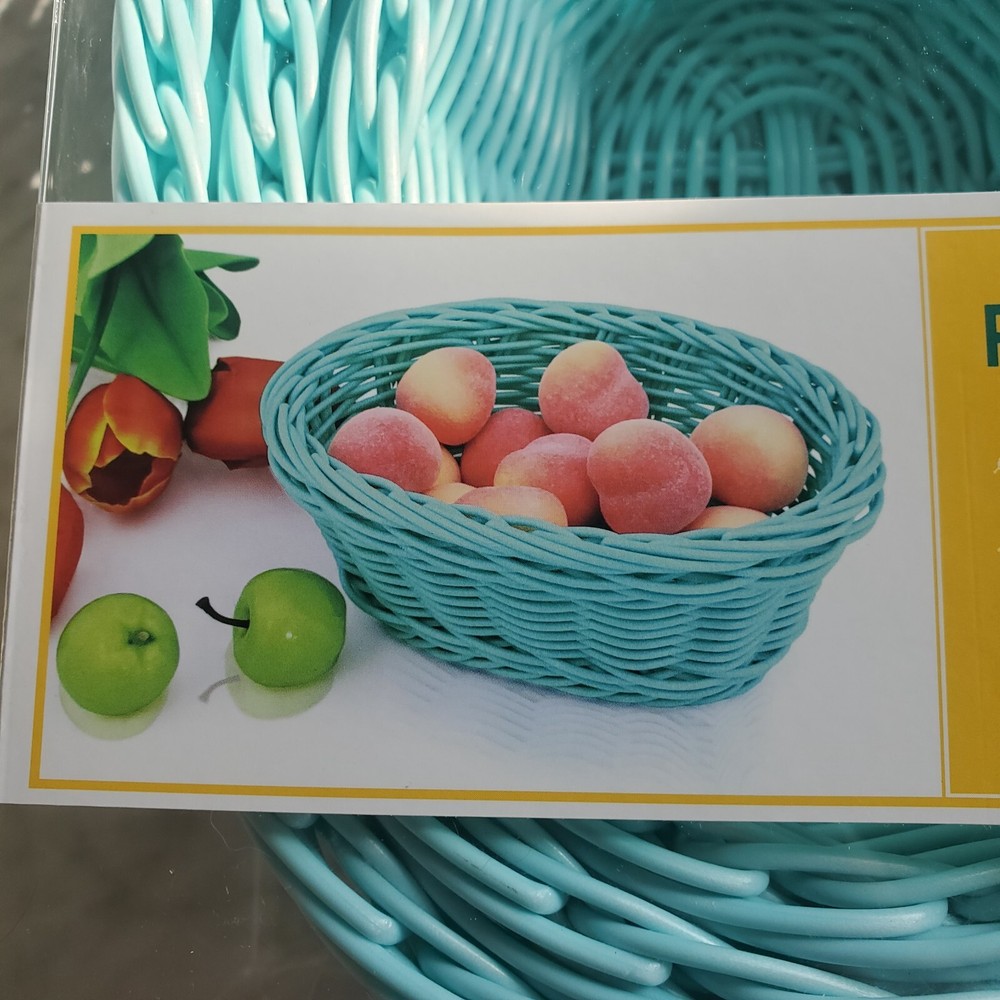 3 woven plastic baskets. sky blue