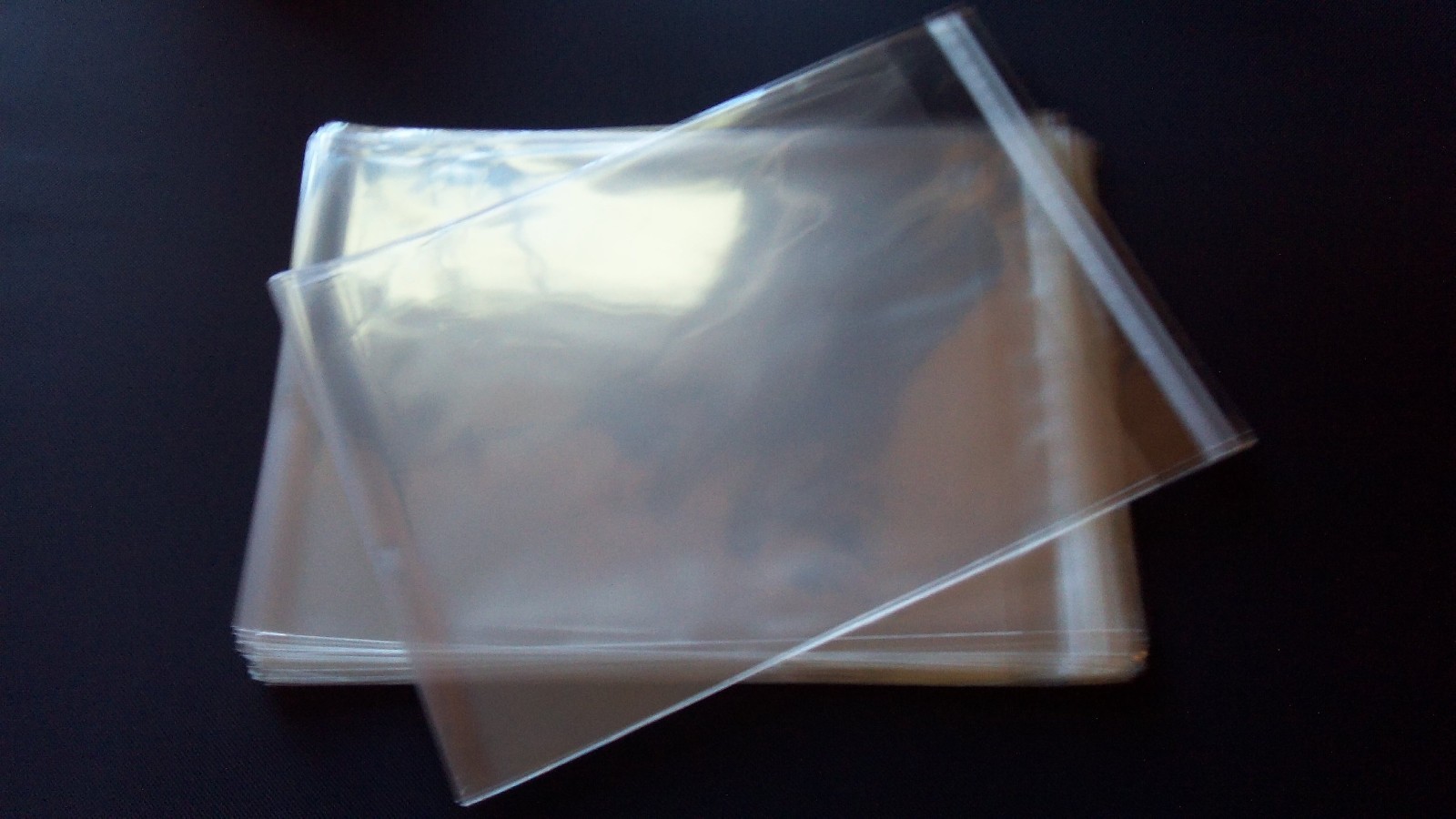 100- 10"x13" CRYSTAL CLEAR SELF SEALING RECLOSABLE CELLO BAGS