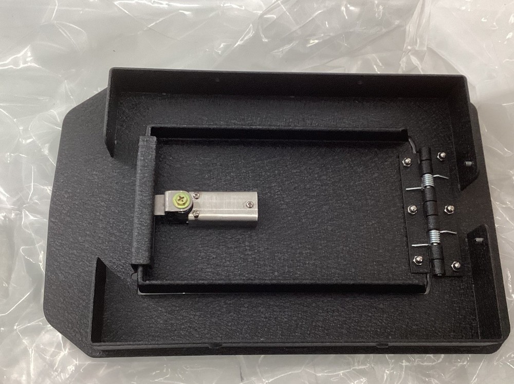 Center Console Gun Safe With Password Retrieval Key.