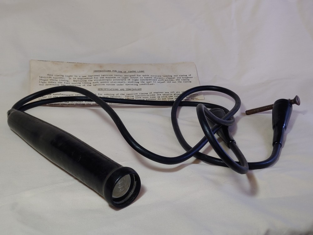 Vintage auto engine timing light with box and instruction sheet---UNTESTED