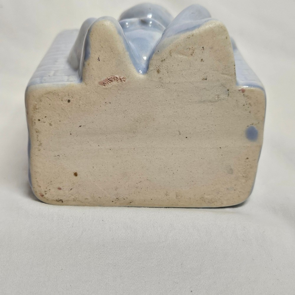 Vintage Niloak Circus Monkey planter, light blue, 4" tall