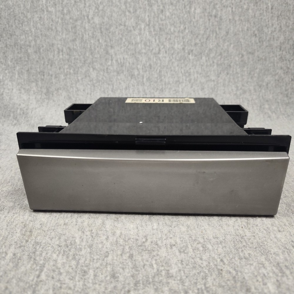 05 Legacy Accessory Holder Compartment Below Radio - Grey