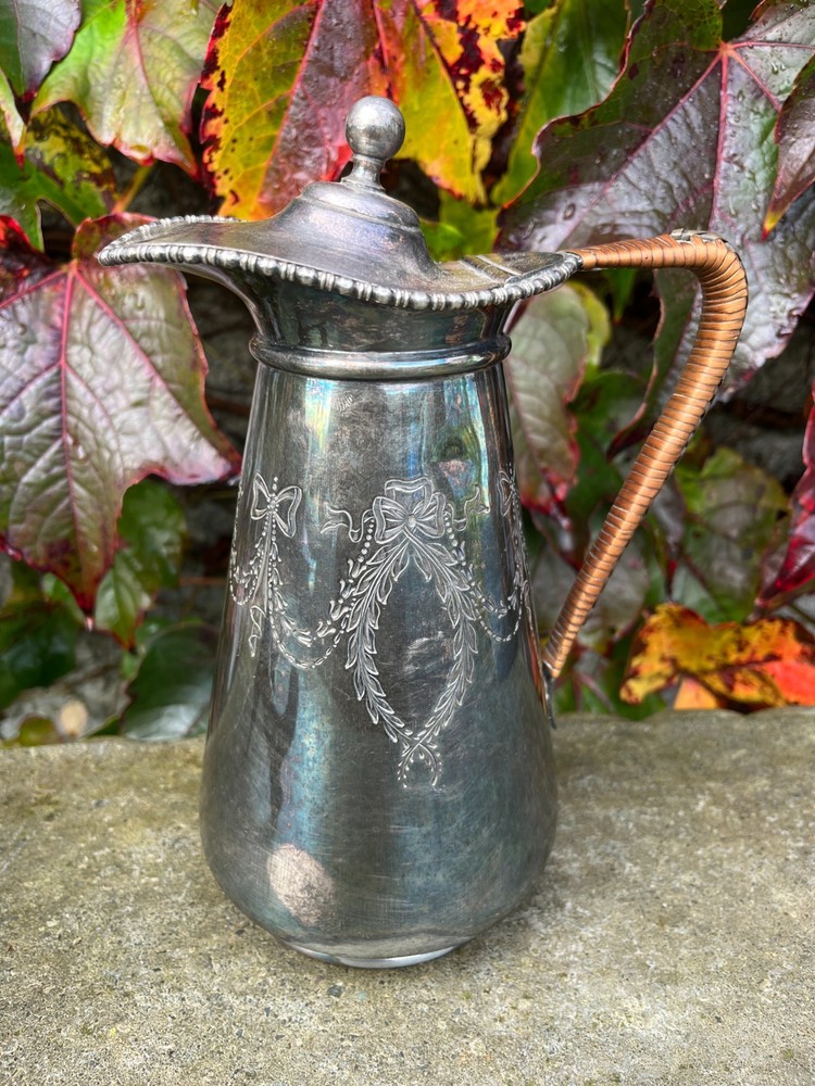 Antique silver plated water pitcher, 19 cm tall.