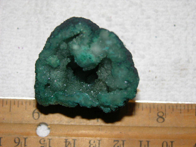 Geode cut & polished half with colored crystal center 1.5 inch E9