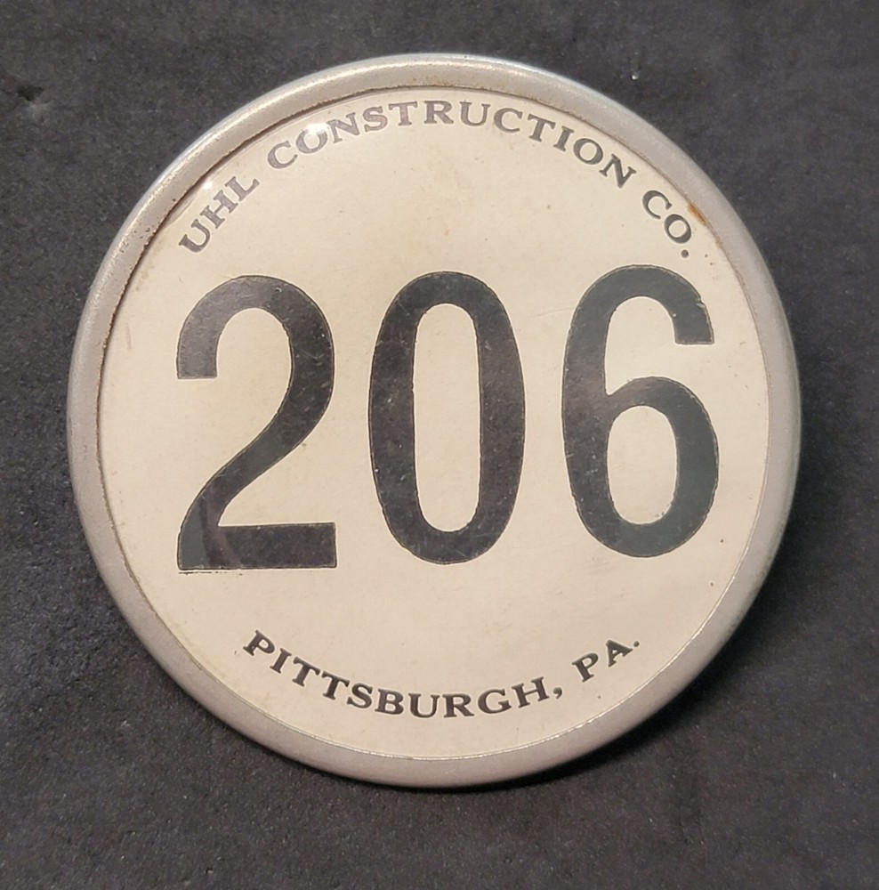 UHL CONSTRUCTION CO. PITTSBURGH PENNSYLVANIA VINTAGE BADGE # 206 PINBACK BUTTON
