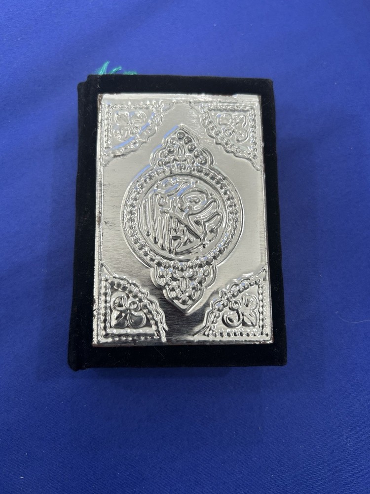 Decorative Silver-tone Islamic Prayer Book with Arabic Script
