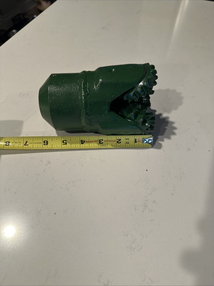 Tricone drill bit