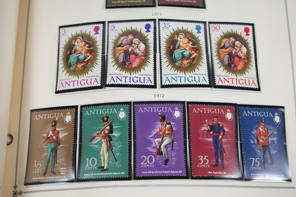 WORLDWIDE A-L 1970s COLLECTION OF 875+ STAMPS MINT & USED STORED IN SCOTT ALBUM