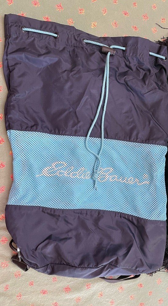 Eddie Bauer navy and teal drawstring bag with backpack straps