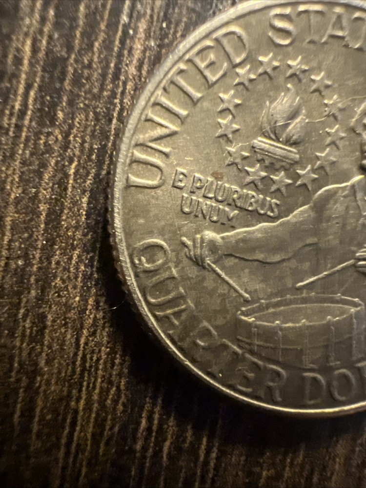 “25 cents USA mint error”