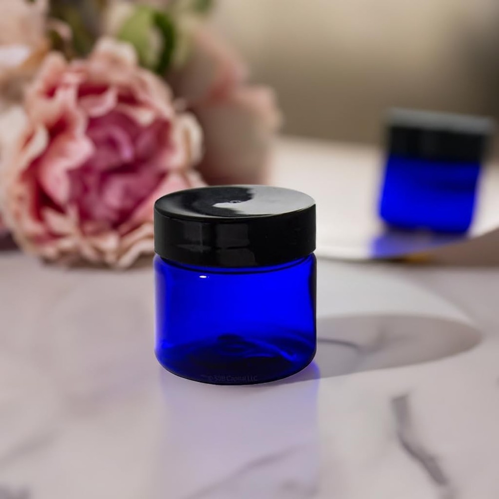 (12 pack) 1 oz Plastic Cobalt Blue Refillable Jars With Black Smooth Lids