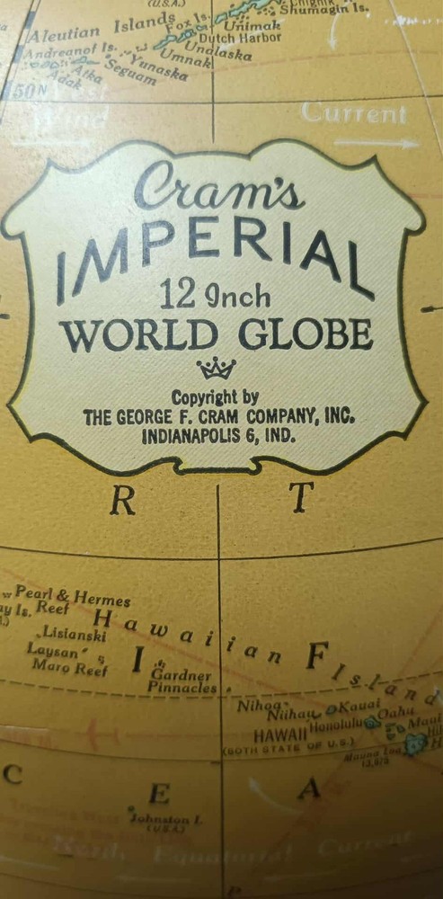 Vintage Cram's IMPERIAL 12 inch world globe. Raised relief and solid wood base.