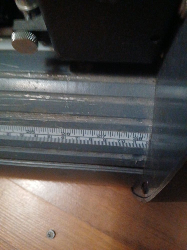 computer-controlled vinyl cutter machine Some Vinyl Material And Two Discs