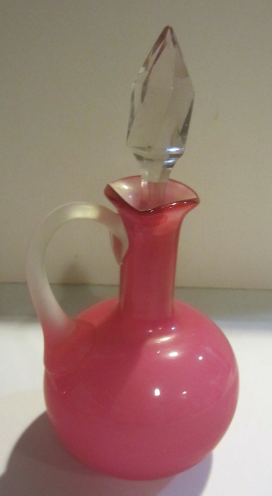 Frosted cranberry color perfume bottle