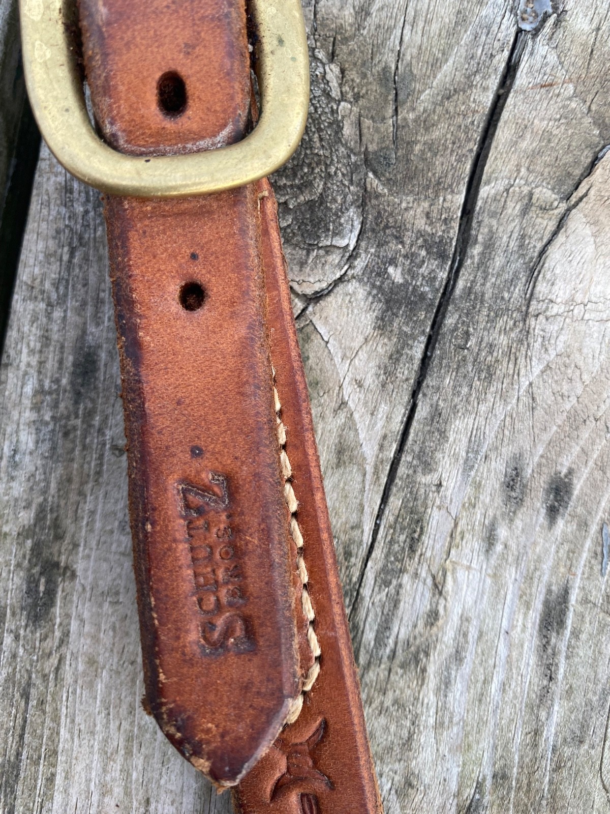 Used Schutz Bros barb wire tooled one ear western headstall w/quick change ends