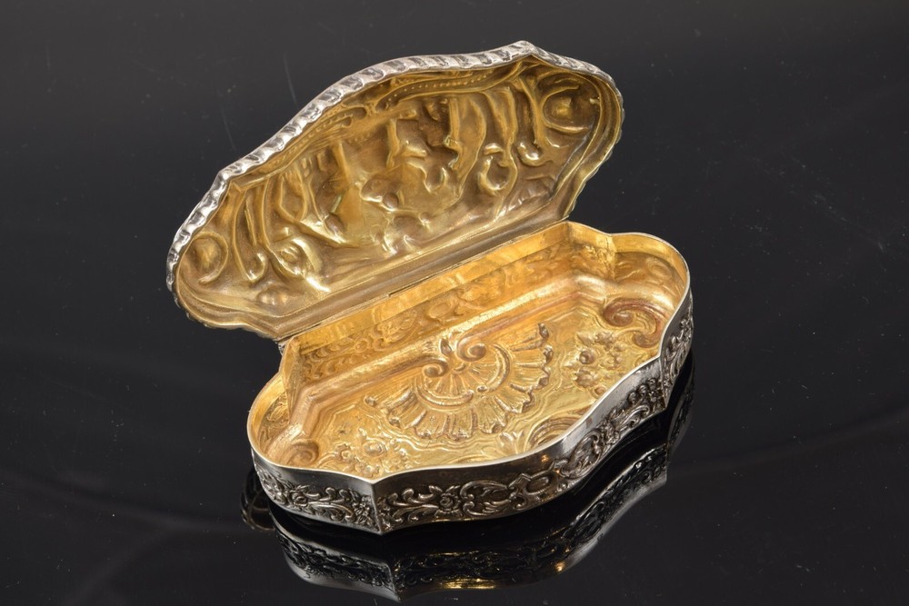 Carved silver box, 20th century.